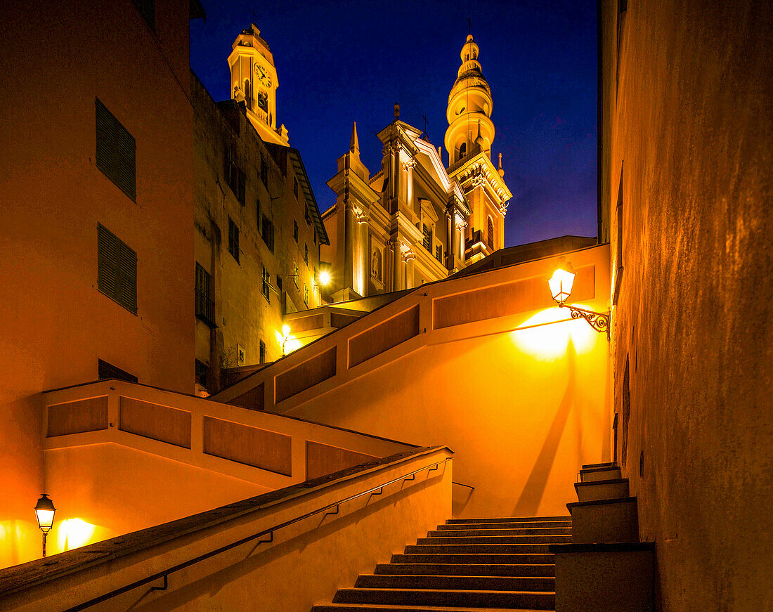 Stairs to Saint Michel Basilica in Menton old town in lantern light, Menton; Alpes-Maritimes department, French Riviera, France