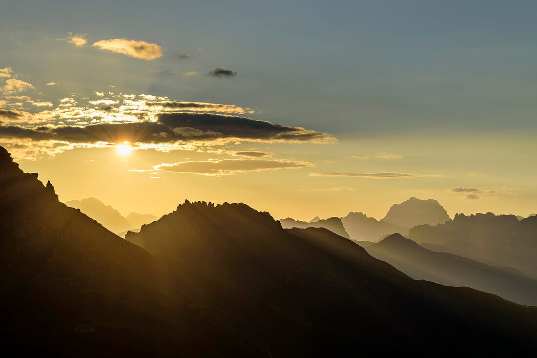 Sunrise with backdrop gradation of Dolomite peaks, from Marmolada, Dolomites, Dolomites UNESCO World Heritage Site, Trentino, Italy