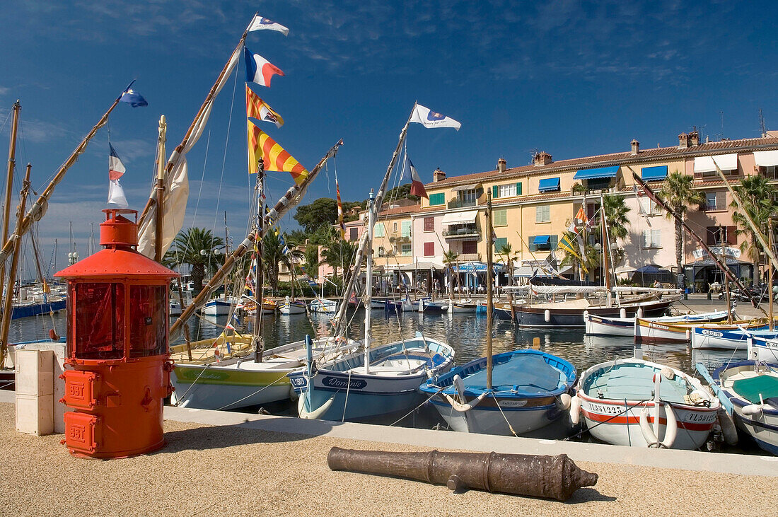 Fishing boats and old cannon in Sanary Harbour, Sanary sur Mer, Var , south of F