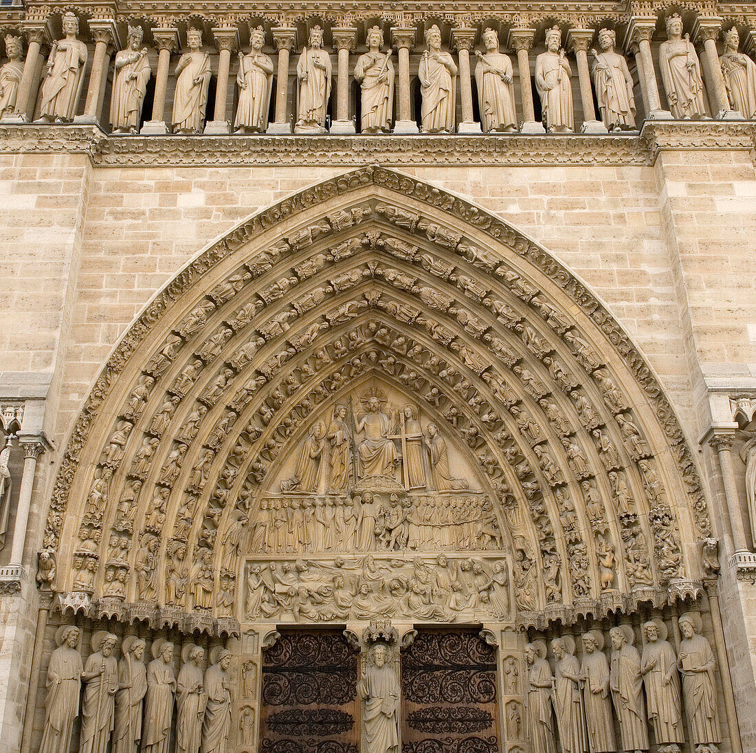 Carved stone details on the front of Notre Dame Cathedral, Paris, France