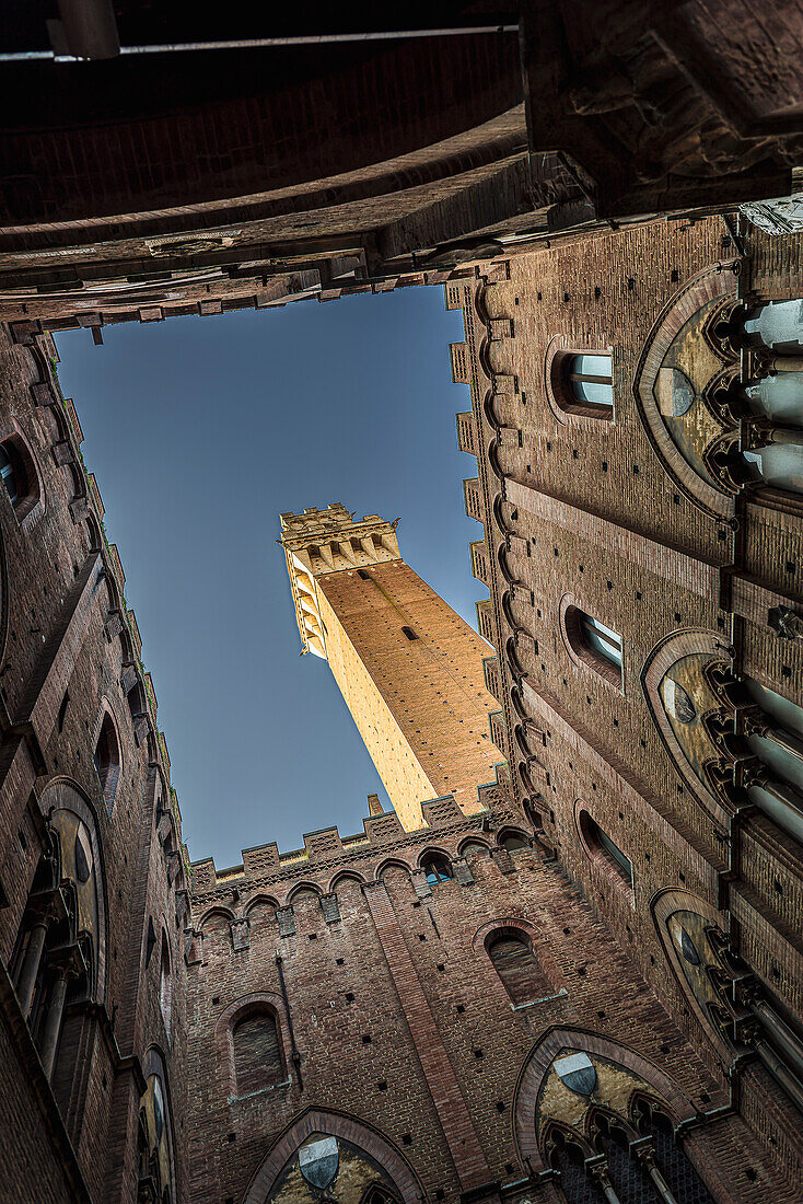 Torre del Mangia tower, courtyard of the Palazzo Pubblico town hall, Piazza del Campo, Siena, Tuscany, Italy, Europe