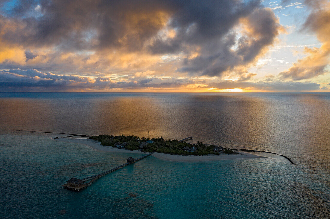 Resort island at sunset, North Ari Atoll, Indian Ocean, Maldives