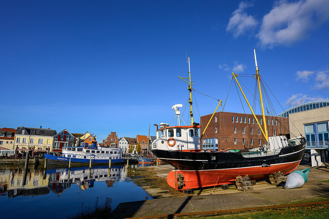Town hall with old cutter on Slipanlange, inland port, Husum, North Friesland, North Sea coast, Schleswig Holstein, Germany, Europe