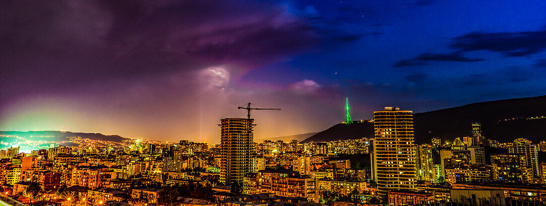 Dramatic evening sky with flashlight during thunder in Tbilisi, Georgia