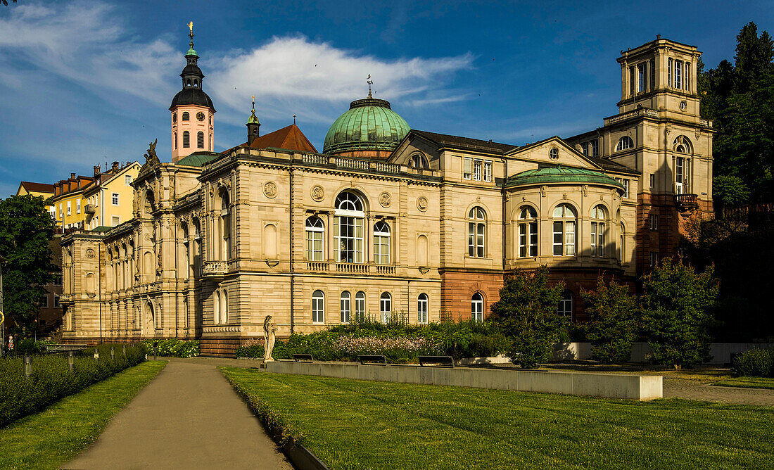 Friedrichsbad and tower of the Stadtkirche in Baden-Baden, Baden-Württemberg, Germany