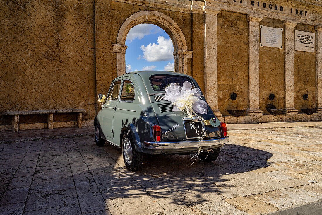 Festively decorated wedding car in Sorano, Province of Grosseto, Tuscany, Italy, Europe