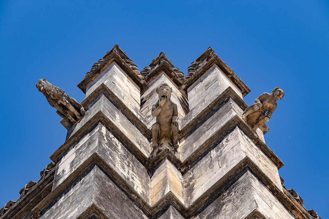 Various ornate gargoyles on the facade of the Monastery of Mosteiro de Alcobaca, Portugal