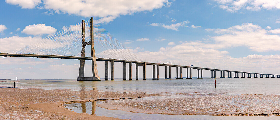 The long cable-stayed Vasco da Gama bridge over the Tagus River connects Lisbon with Montijo in southeastern Portugal