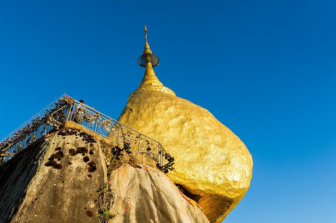 Myanmar (formerly Burma). Kyaiktiyo. State Mon. Sacred site of the golden rock.