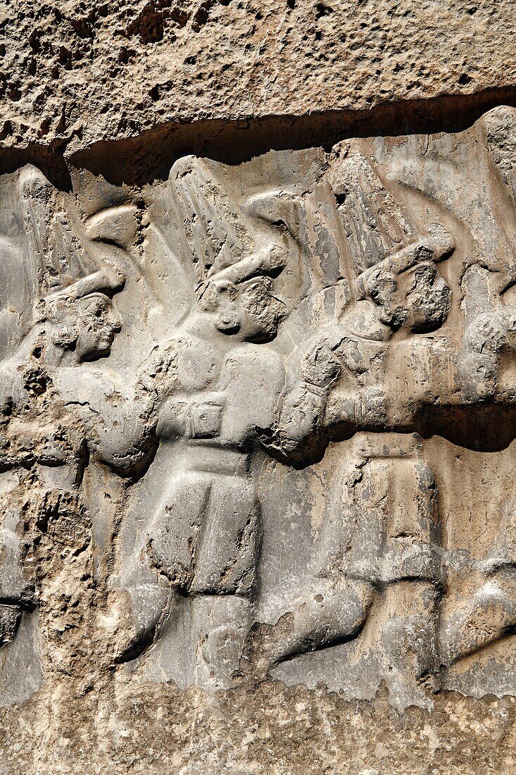 Close up of the sculpture of the twelve gods of the underworld from the 13th century BC Hittite religious rock carvings of Yazilikaya Hittite rock sanctuary,chamber B,Hattusa,Bogazale,Turkey.