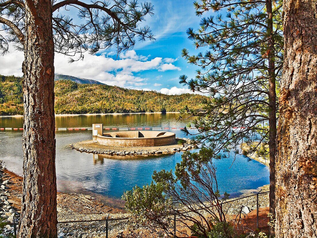 Whiskeytown Lake ''glory hole'' is an overflow drain not the same as a spillway but is available to prevent overflow from excess water behind the dam.