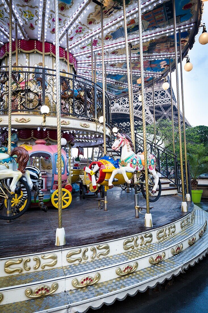 Traditionnal Parisian carousel near Eiffel Tower.