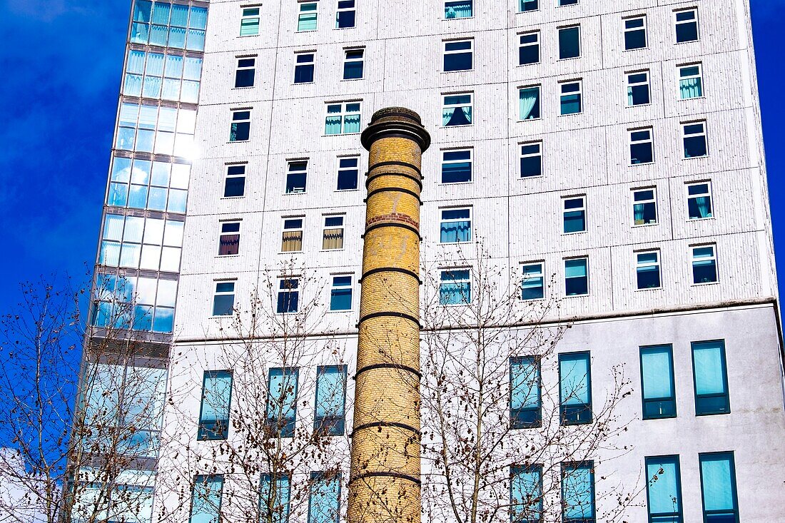 Former Philips factory pipe in front of the Admirant Tower in Eindhoven,The Netherlands,Europe.