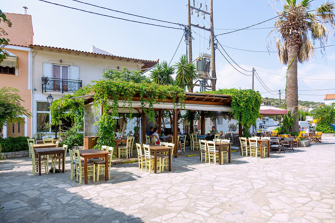 Platea with tavern To Steki tou Manoli in Paleokastro in the east of the island of Samos in Greece