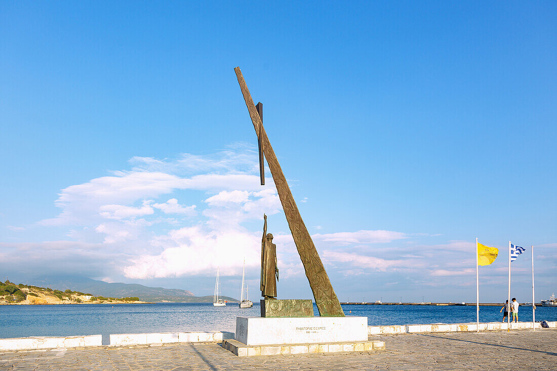 Pythagoras monument on the ancient pier of Pythagorion on the island of Samos in Greece