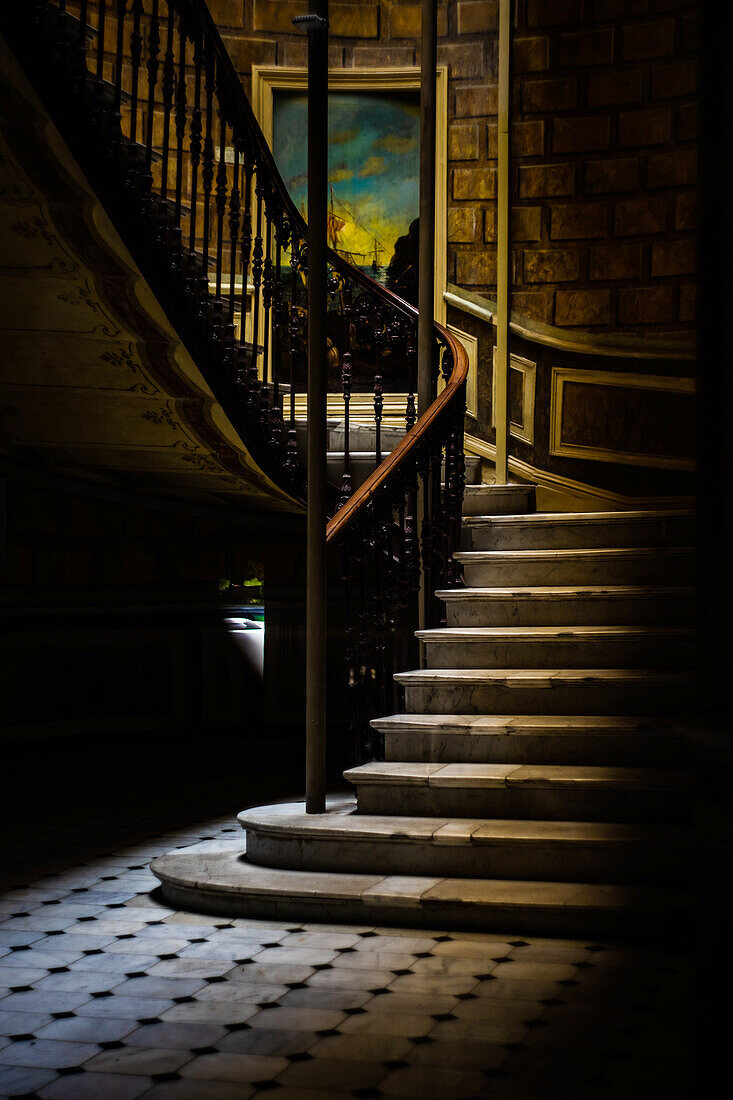 Old Tbilisi's maison stairways with spiral staircase decorated with carving metal holder