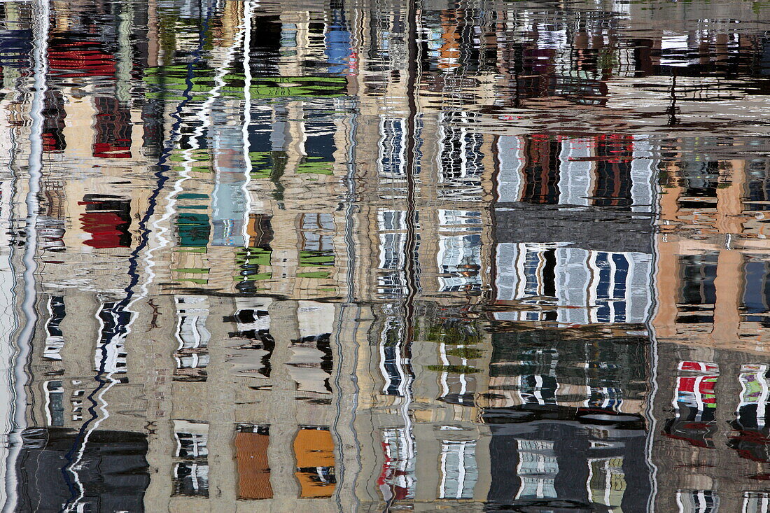 Reflection of houses at the old harbor of Honfleur, Côte Fleurie, Normandy, France