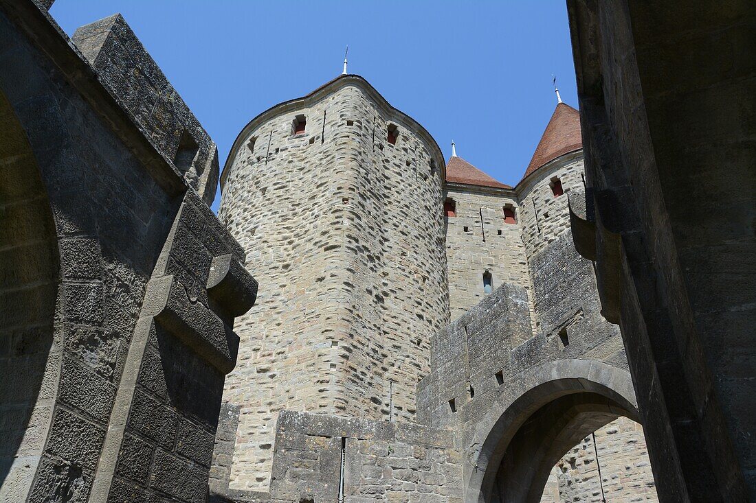 Partial view of the towers that compose the Narbonne Gate to the fortified city of Carcassonne. Languedoc - Roussillon,France.