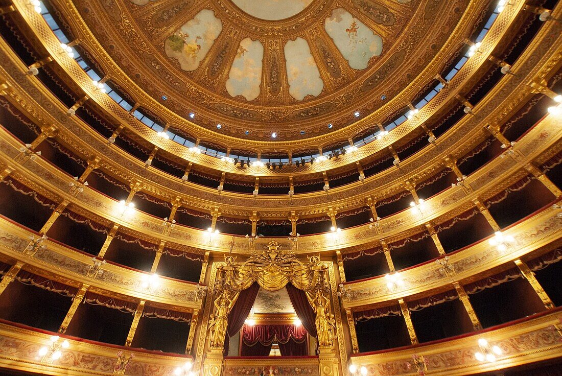 The Teatro Massimo in Palermo,3200 seats,is Italy's largest and Europe's third largest opera house. It was built in the style of historicism at Piazza Verdi. The architect was Giovanni Battista Filippo Basile,who started in 1875 with the construction. At his death,the building was completed in 1897 by his son Ernesto Basile. The Opera closed in 1974 due to renovation. The Teatro Massimo was closed for more than 20 years,because of corrupt,mafia-building policy. In 1997 it was reopened with Verdi's opera Nabucco,Palermo,Sicily,Italy,Europe.