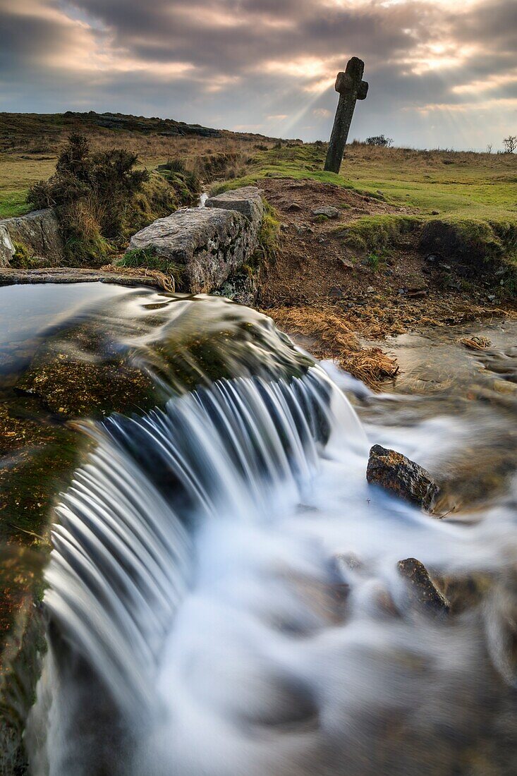 A waterfall on the Devonport Leat at Windy Post in the Dartmoor National Park. A long shutter speed was utilised to blur the movement in the water coming over the falls on an afternoon in mid January.