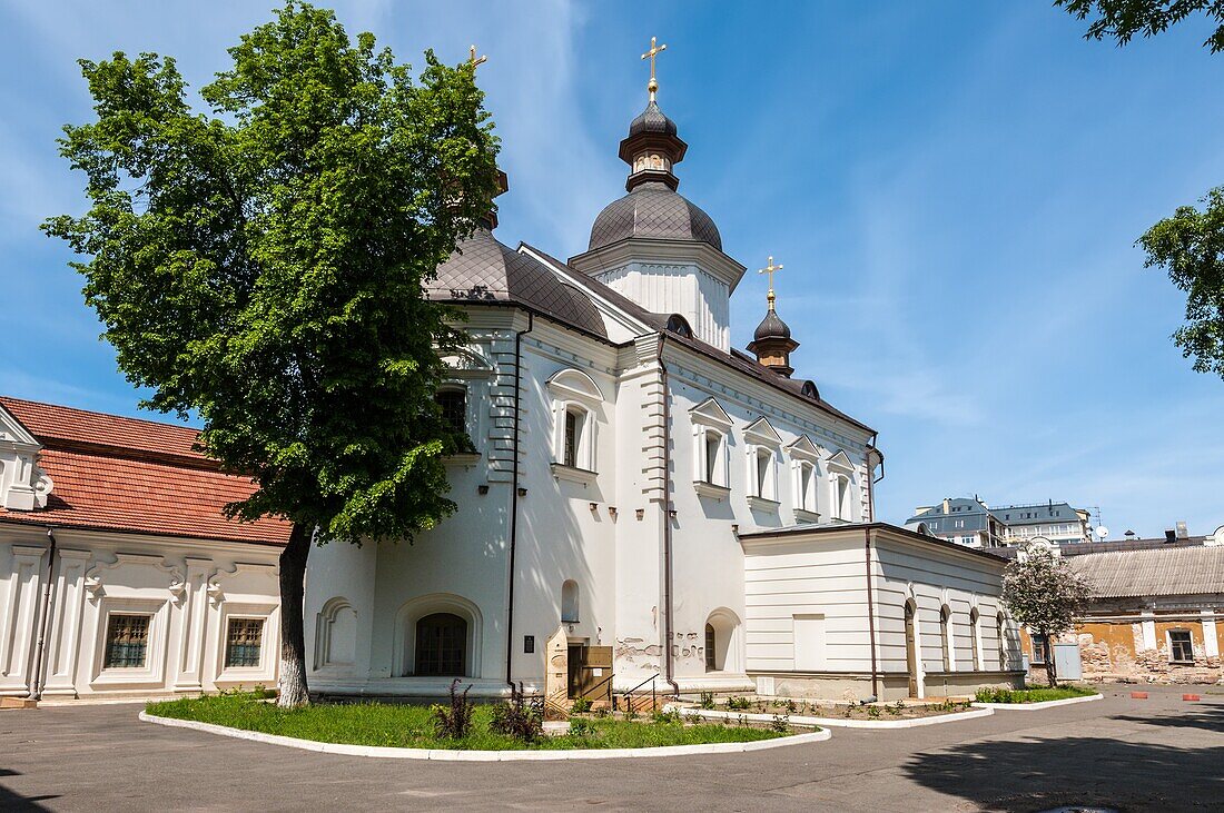 Kyiv,Ukraine - May 10,2015: Refectory with the church of the Holy Spirit (1631) in the Kiev-Mohyla Academy at historic district called Podil (Podol),Kyiv downtown.