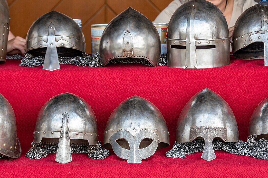 Old metal and chainmail helmets in Checiny Royal Castle in  Checiny Poland.