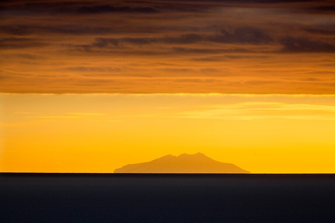 Sunset with Montecristo island from Castiglione della Pescaia,province of Grosseto,Tuscany,Italy,Europe.