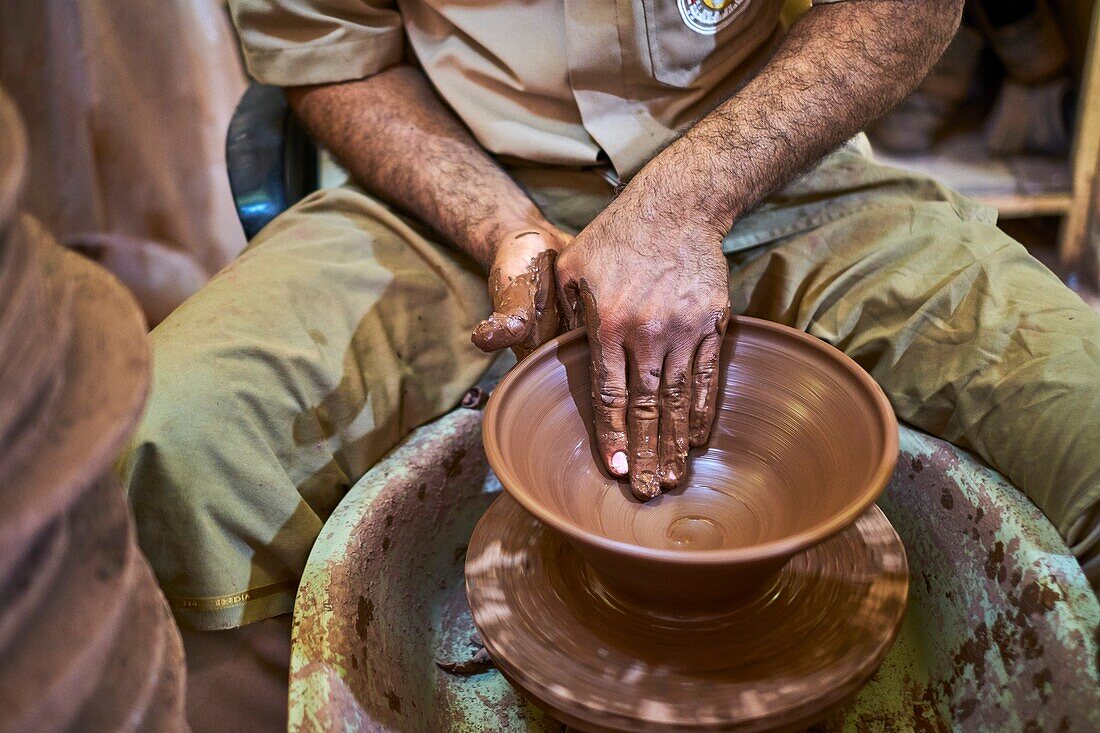 Sultanate of Oman,Ad-Dakhiliyah Region,Bahla,potter at the factory.