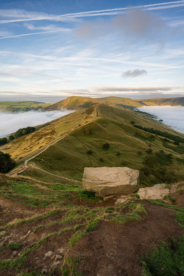 A cloud inversion either side of The Great Ridge and Mam Tor, Peak District, Derbyshire, England, United Kingdom, Europe