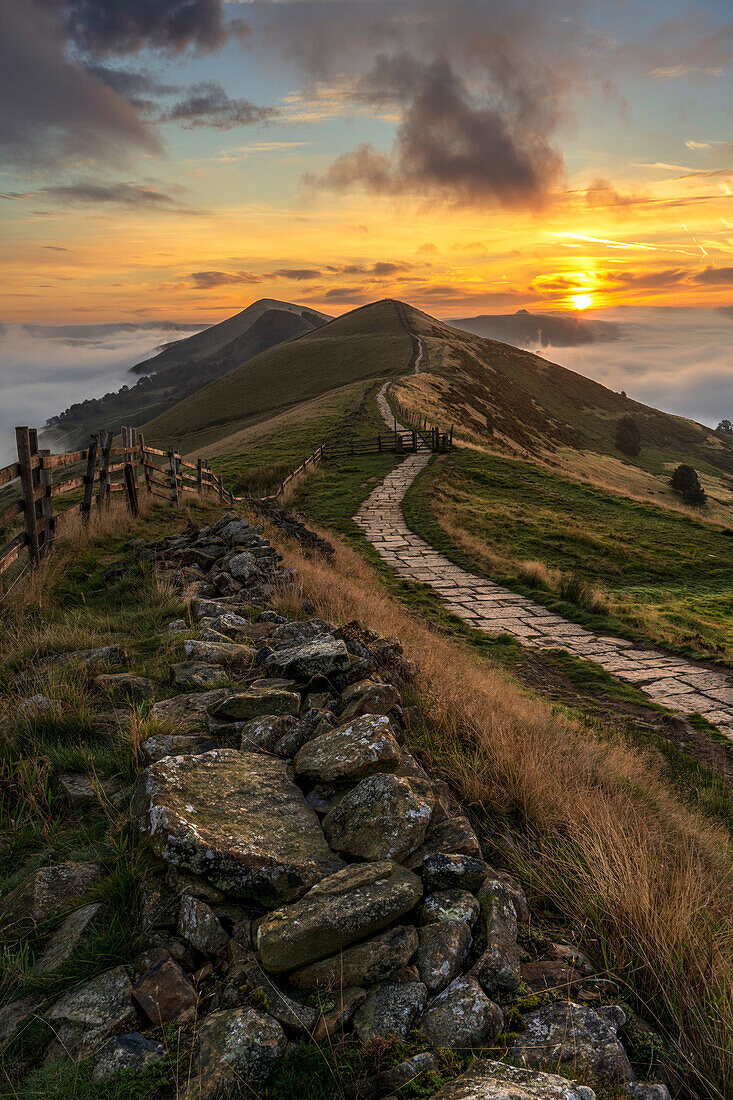 Path leading towards The Great Ridge with cloud inversion from Mam Tor, Peak District National Park, Derbyshire, England, United Kingdom, Europe