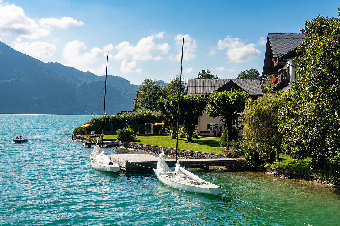 Austria, Houses and boats at Wolfgangsee in summer