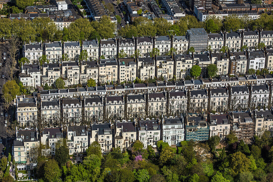 UK, London, Aerial view of rows of Victorian townhouses in Holland Park