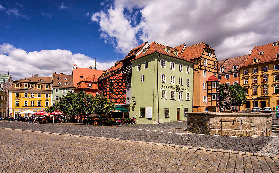 Historical buildings, fountains and gastronomy at the lower part of the market square of Eger (Cheb), West Bohemia, Czech Republic