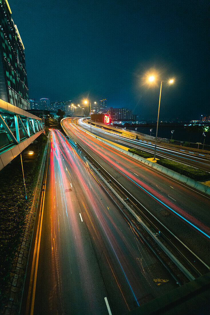 Long exposure of traffic moving on bridge during dusk, Hong Kong