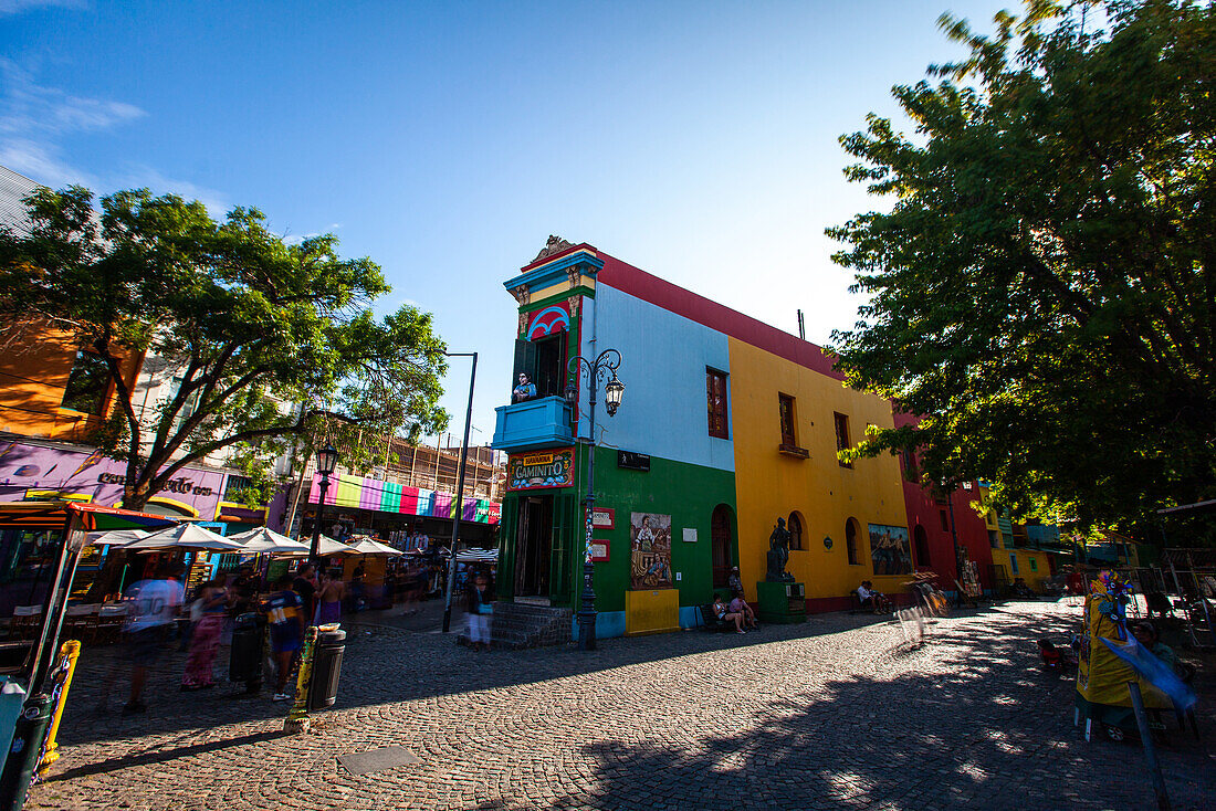 View of tourist at Caminito street museum and traditional alley, La Boca