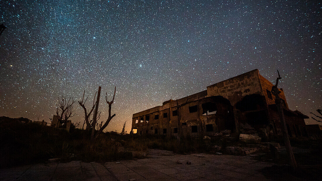 View of abandoned building against milky way in sky, Villa Epecuen