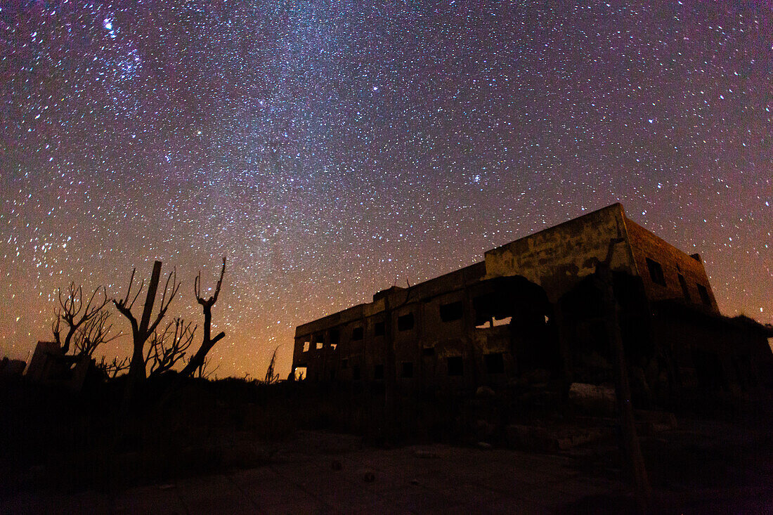 View of abandoned building against milky way in sky, Villa Epecuen