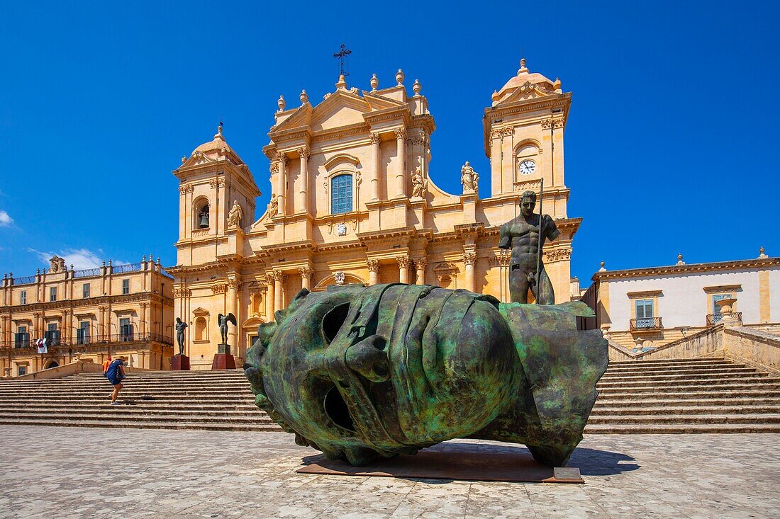 Mitoraj sculpture in front of the Cathedral of San Nicolo, UNESCO World Heritage Site, Noto, Siracusa, Sicily, Italy, Europe