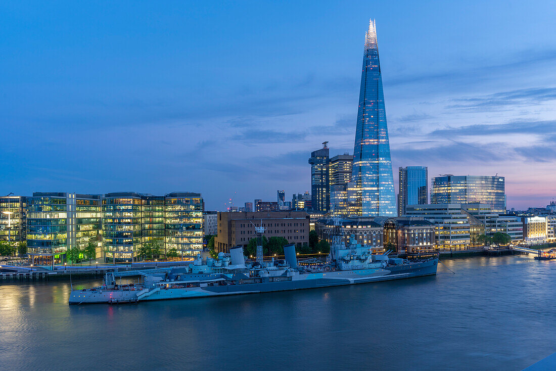View of the Shard, HMS Belfast and River Thames from Cheval Three Quays at dusk, London, England, United Kingdom, Europe