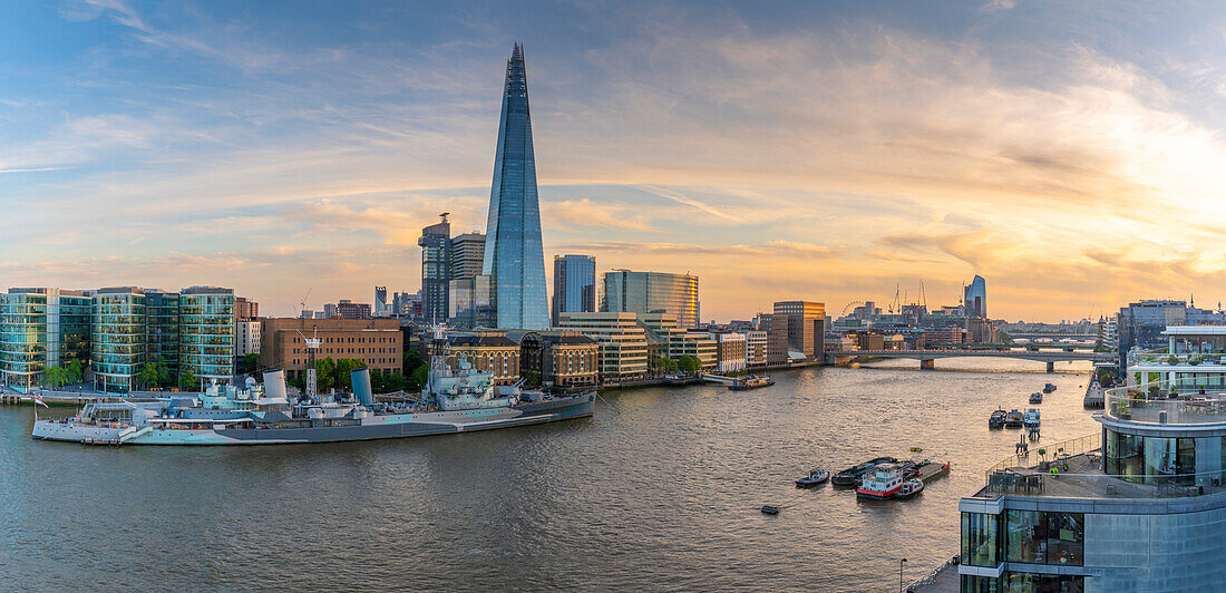 View of The Shard, HMS Belfast and River Thames from Cheval Three Quays at sunset, London, England, United Kingdom, Europe