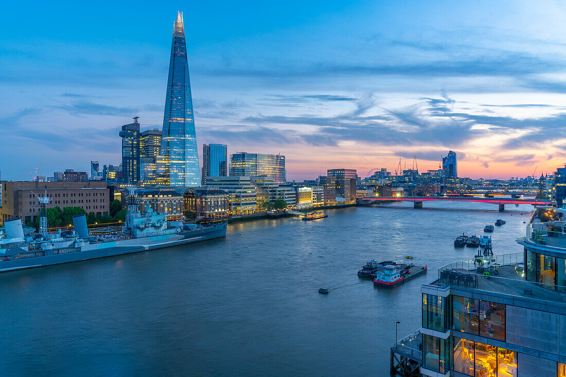 View of The Shard, HMS Belfast and River Thames from Cheval Three Quays at dusk, London, England, United Kingdom, Europe