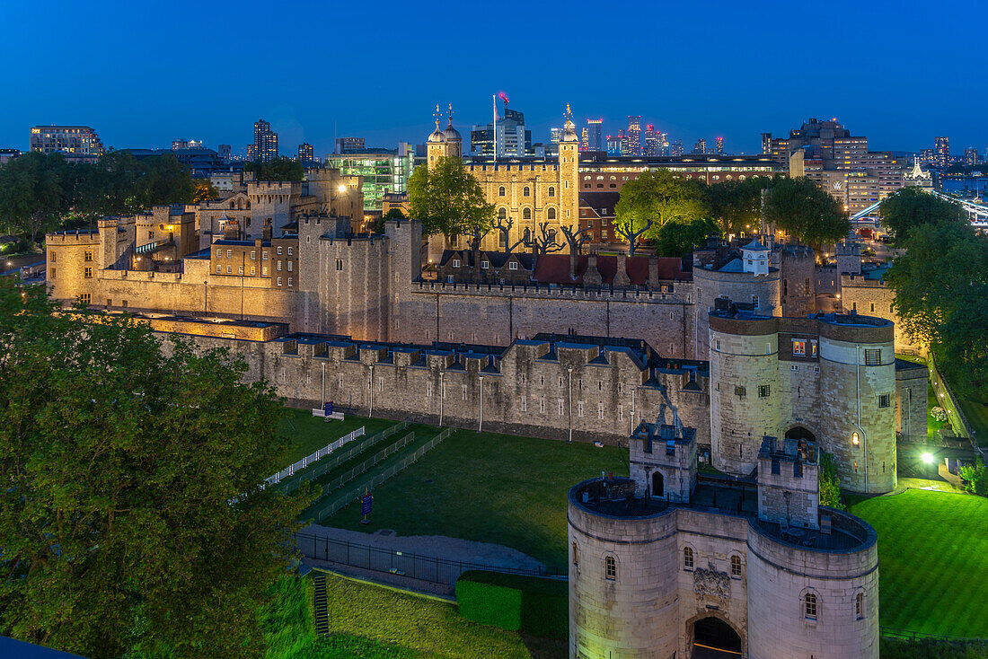 View of the Tower of London, UNESCO World Heritage Site, from Cheval Three Quays at dusk, London, England, United Kingdom, Europe