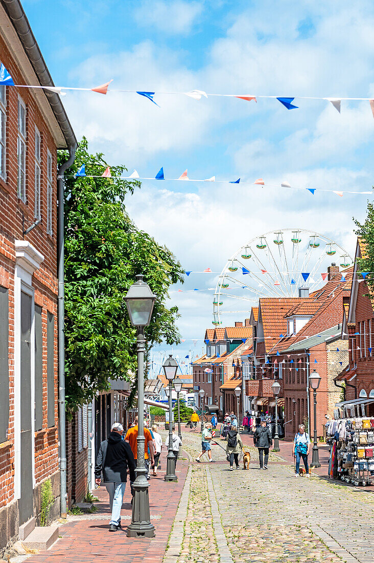 View through the city center of Heiligenhafen to the Ferris wheel, Heiligenhafen, Hafenfesttage, Ostholstein, Schleswig-Holstein, Germany