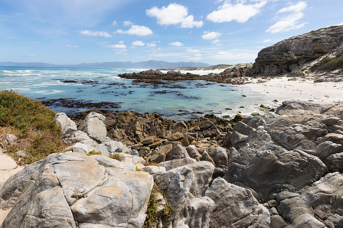 South Africa, Western Cape, Rock formations and ocean in Walker Bay Nature Reserve