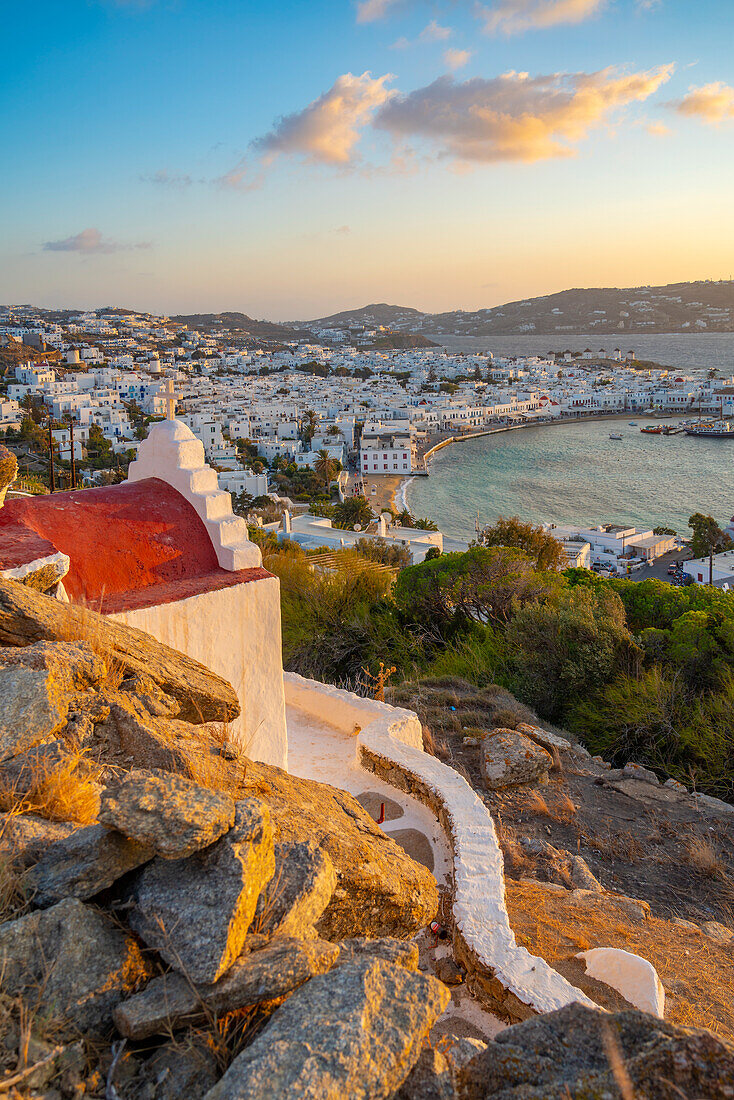 View of chapel and town from elevated view point at sunset, Mykonos Town, Mykonos, Cyclades Islands, Greek Islands, Aegean Sea, Greece, Europe