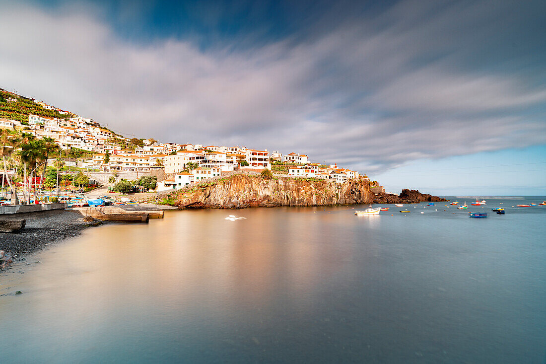 Harbor of the white town Camara de Lobos perched on cliffs, Madeira island, Portugal, Atlantic, Europe