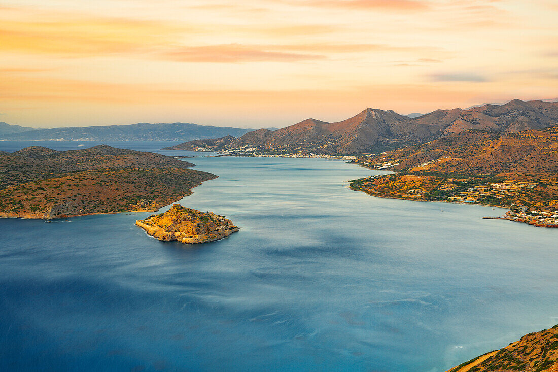 Spinalonga island in the blue sea of Mirabello gulf at sunrise, Plaka, Lasithi prefecture, Crete, Greek Islands, Greece, Europe