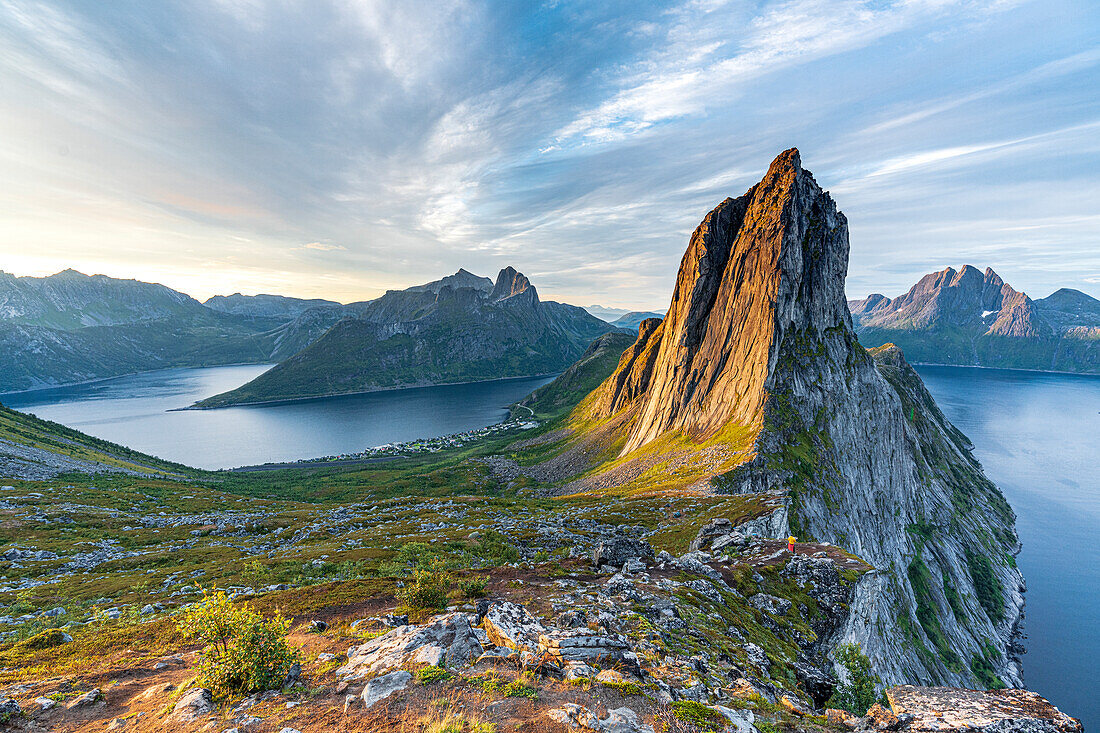 Sunrise over the clear water of the fjord and Segla mountain, Senja island, Troms county, Norway, Scandinavia, Europe