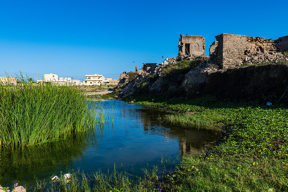 Dilapidated Yemeni-style mud-brick structures, Mirbat, Salalah, Oman, Middle East