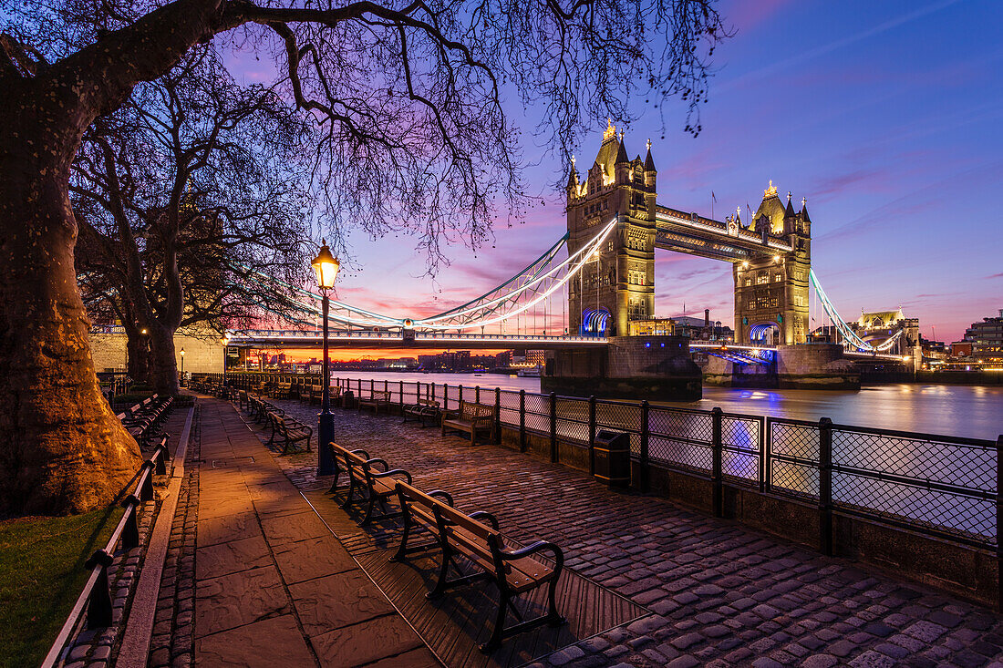 Sunrise view of Tower Bridge from Tower Wharf, Tower of London, London, England, United Kingdom, Europe